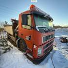 Volvo FM9 4X2 Flatbed truck with tail lift